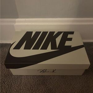 Nike orange Devin Booker basketball shoe